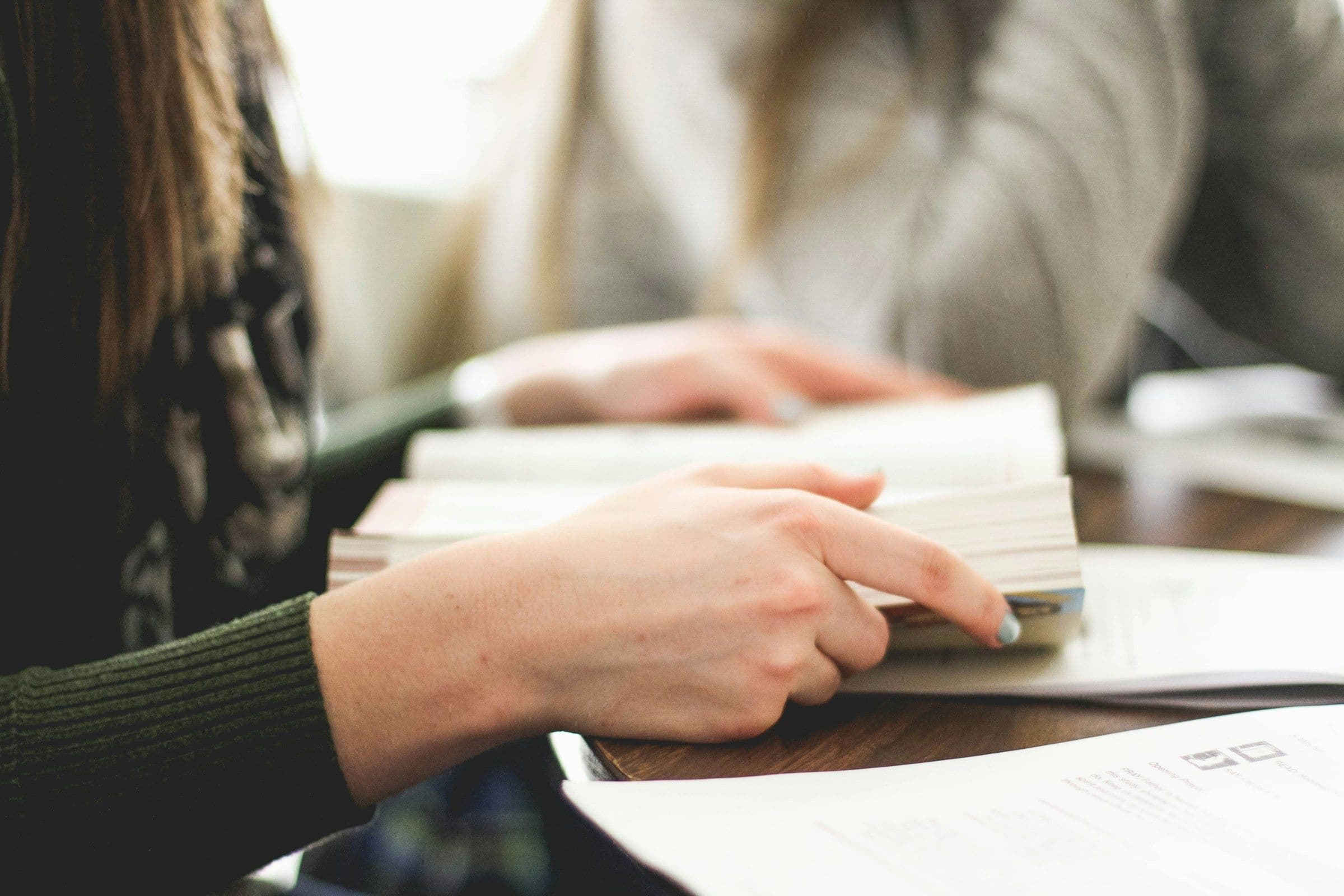 woman reading a book - Best Study Tools