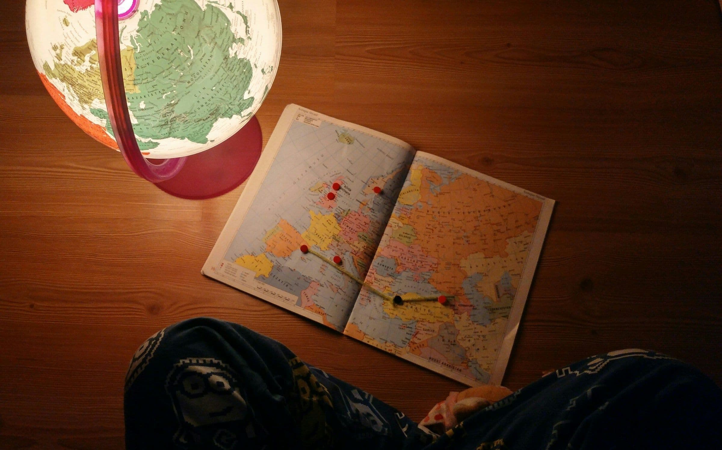 Person Reading Map - How to Study Geography