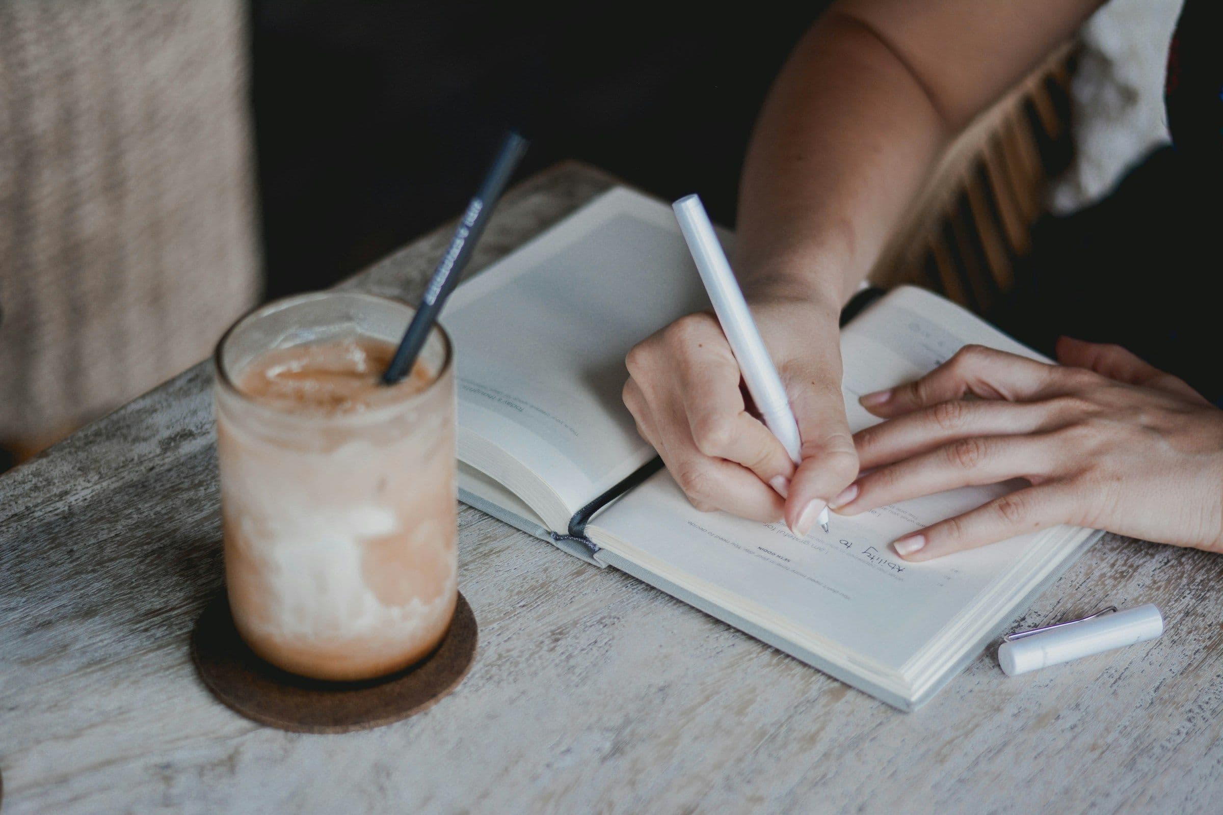 person making notes - Study Strategies