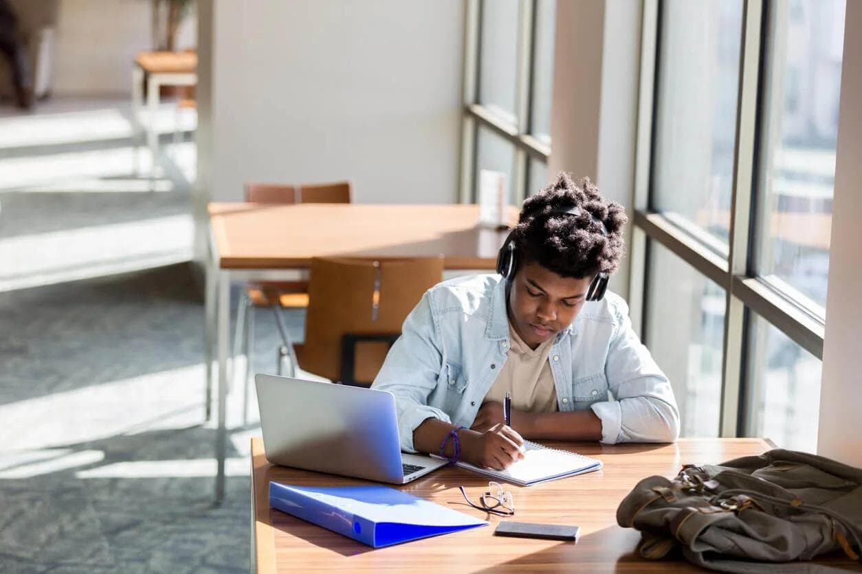person making notes - 7 Secret Methods For Studying
