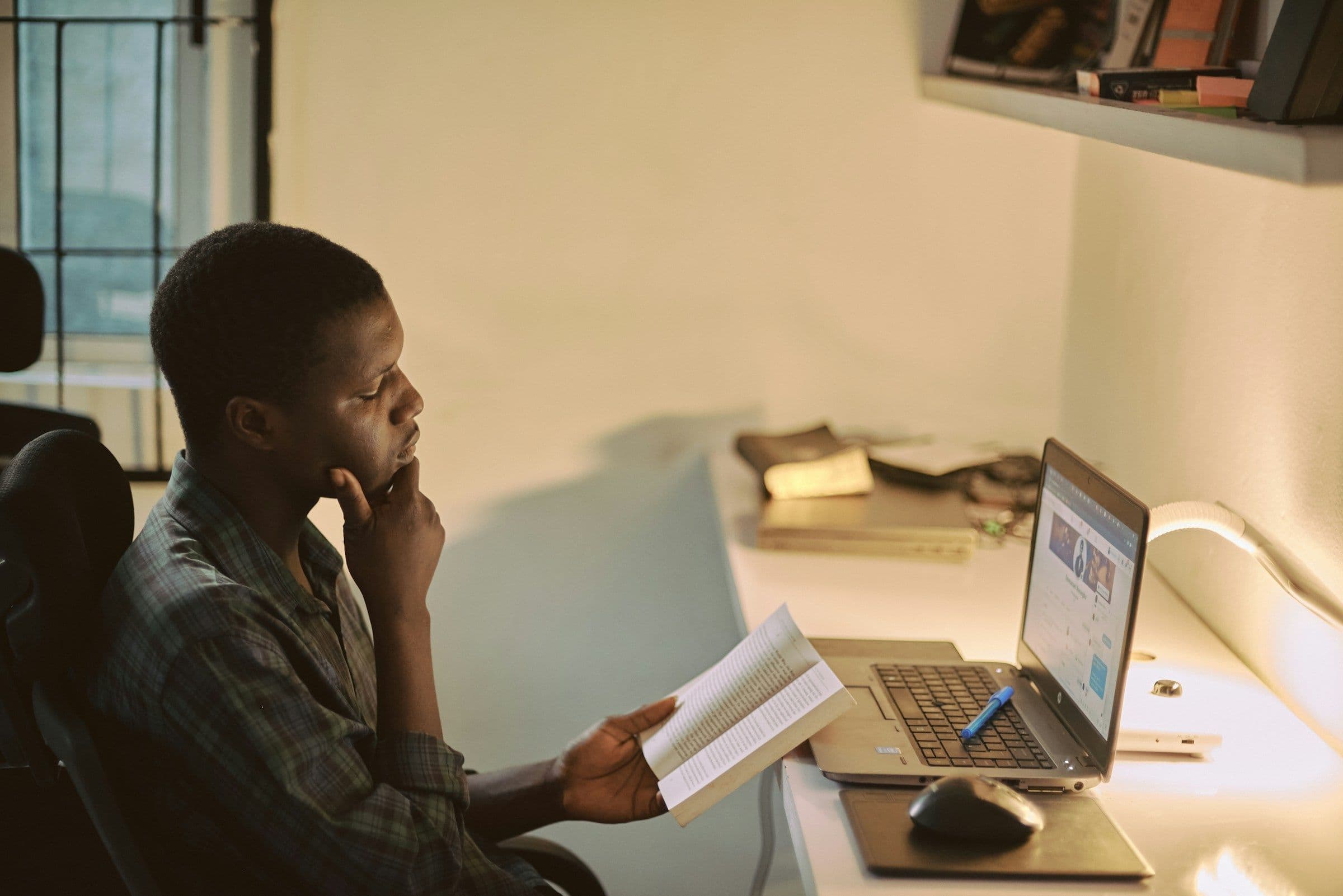 person reading a book - Personalized Learning with AI
