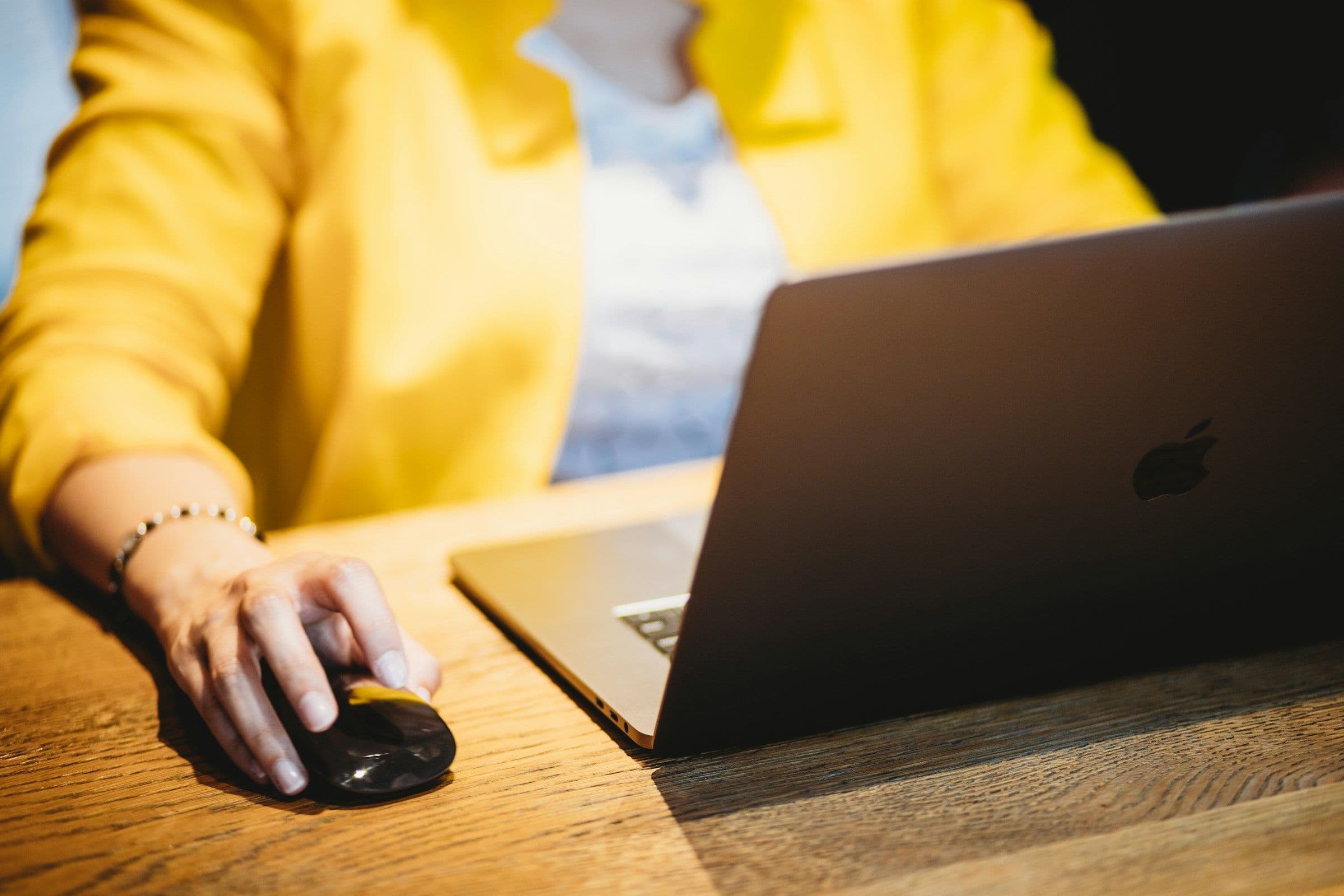 Person Working on Laptop - Best Book Summary Apps